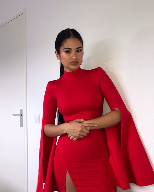 Joy’nae Elisah Bowier in red dress 